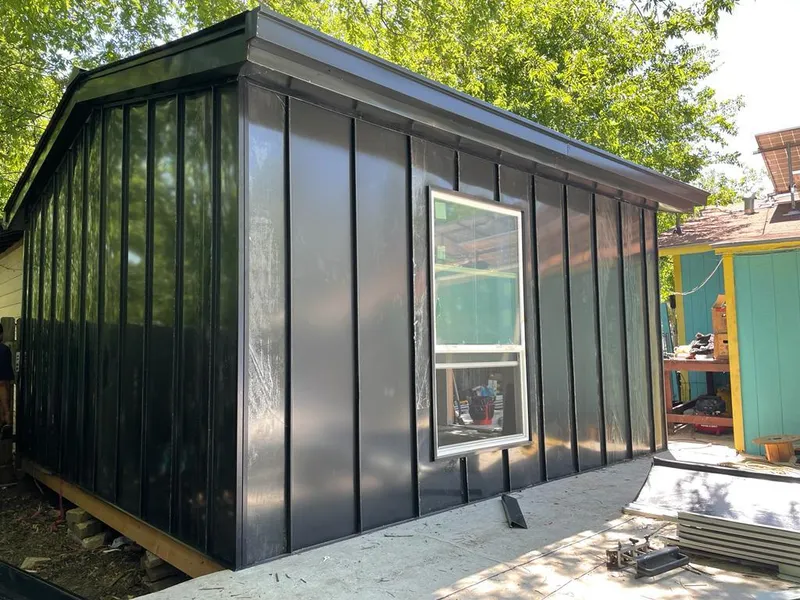 Black standing seam metal wall panels for Metal Roof Installation in Broken Arrow